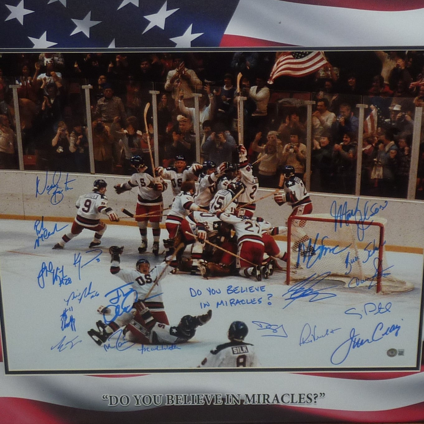 1980 U.S. Olympic Hockey Team Autographed (Miracle On Ice) Deluxe Framed 20x24 Photo - American Flag Matting - 18 Team Member Signatures - Beckett