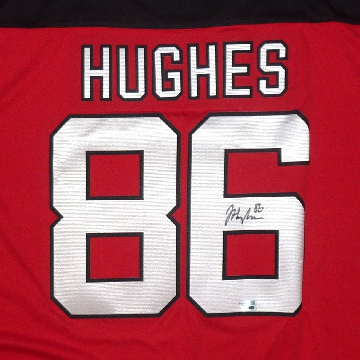 Jack Hughes Autographed New Jersey Devils (Red #86) Breakaway Hockey Jersey Fanatics Authentic