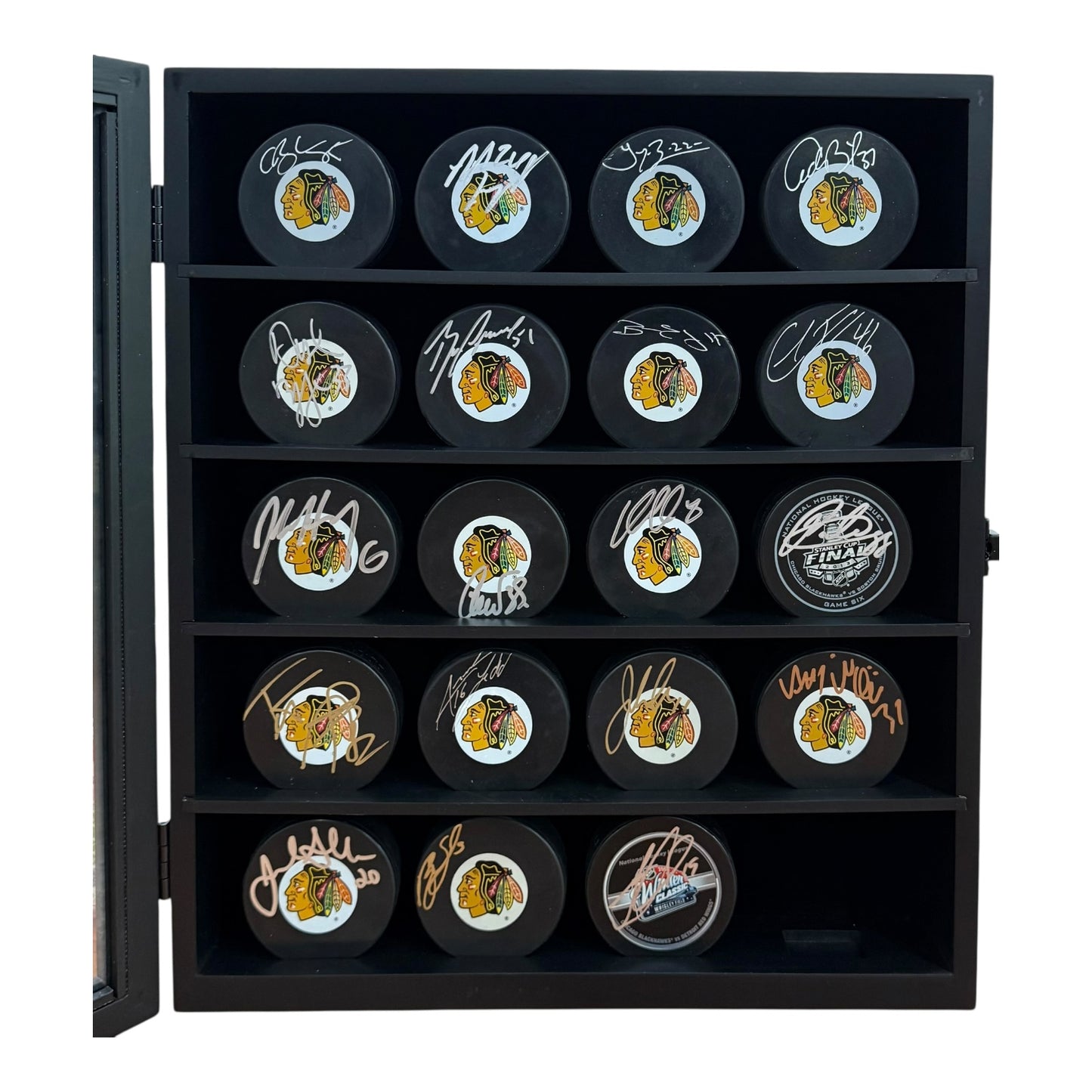 Chicago Blackhawks 2010 Stanley Cup Team Autographed Hockey Puck Set in Display Cabinet - JSA