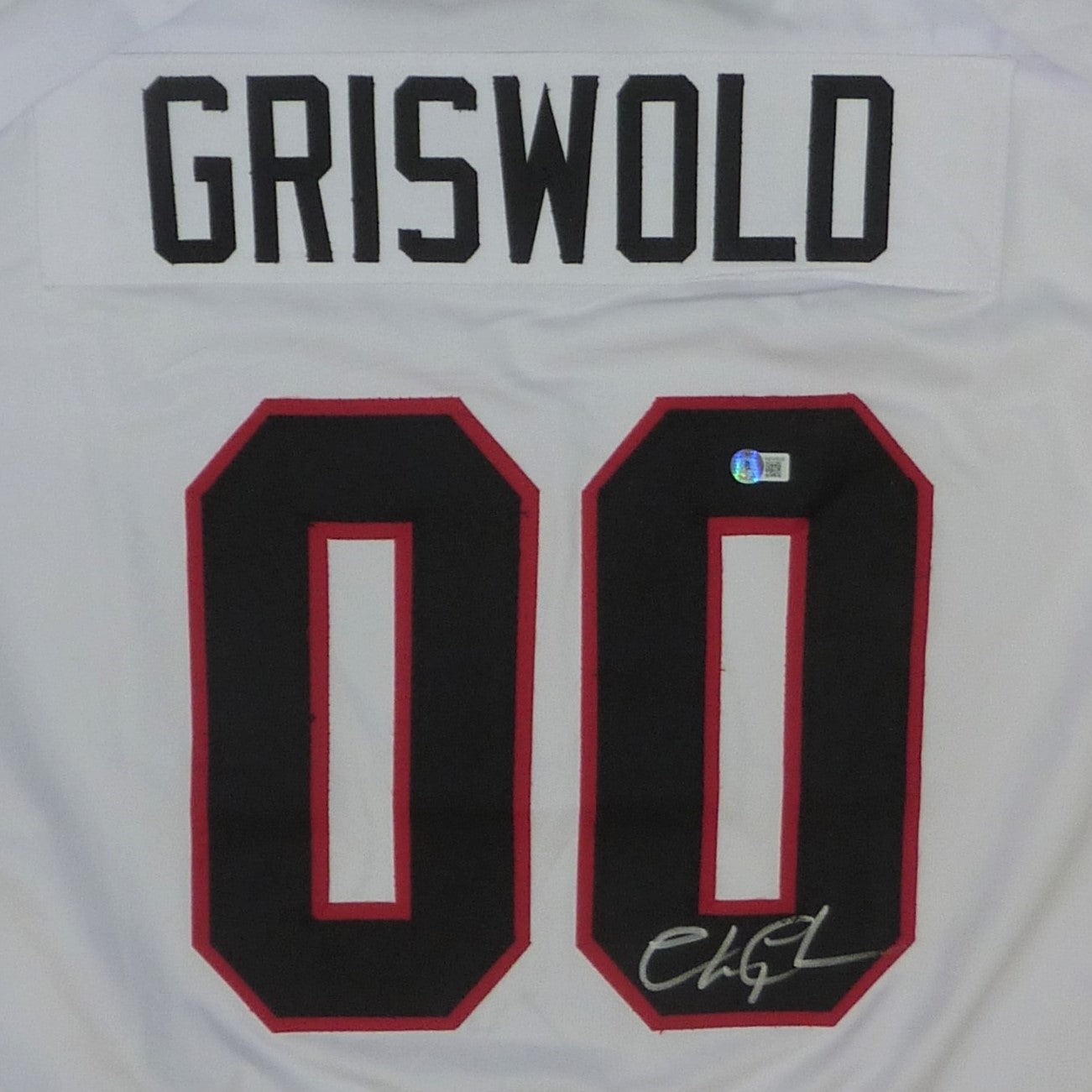 Chevy Chase Autographed “Christmas Vacation” (White #00) Santa Clark  Griswold Custom Hockey Jersey – Beckett Witness