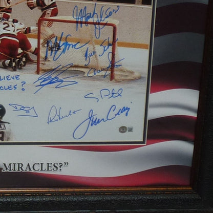 1980 U.S. Olympic Hockey Team Autographed (Miracle On Ice) Deluxe Framed 20x24 Photo - American Flag Matting - 18 Team Member Signatures - Beckett