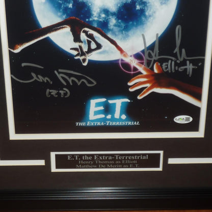 E.T. The Extra-Terrestrial 11x14 Movie Poster Autographed by Henry Thomas (Elliott) And Matthew De Merritt (ET) - JSA