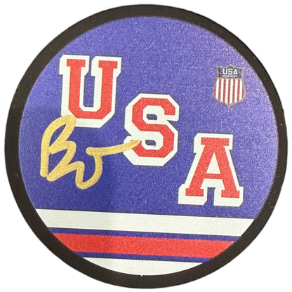 Brady Tkachuk Autographed Team USA Olympics (Blue) Jersey Style Hockey Puck - JSA